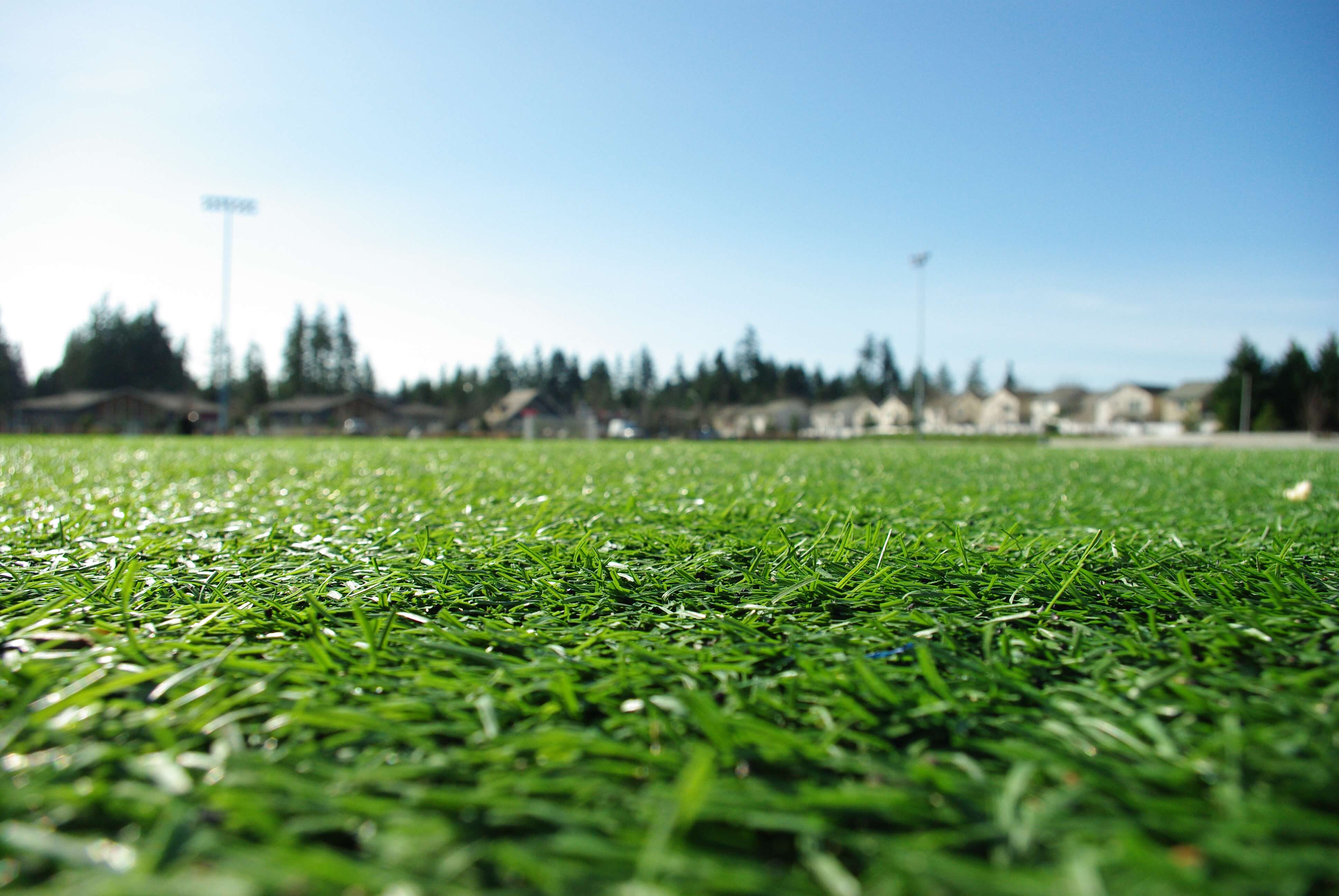 FieldTurf artificial grass fitted in communal field