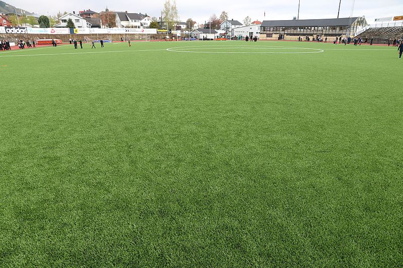 artificial grass fitted in sports field